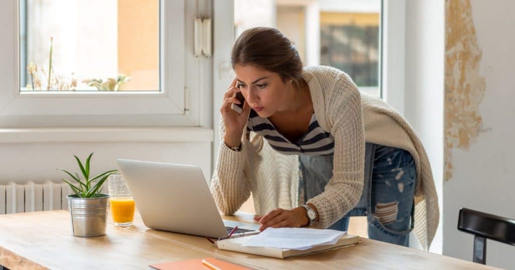 An entrepreneur relaxedly working from home | a featured image from the LOJO resource, "How To Successfully Launch Your Business Online."