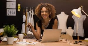 An entrepreneur working on her online branding | a featured image from "How Do I Build Trust Online (For My Brand)?" | LOJO Marketing