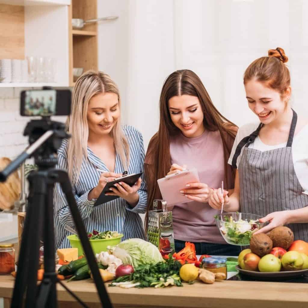 A team of entrepreneurs working on a video shoot for their brand | a featured image from "How Do I Build Trust Online (For My Brand)?" | LOJO Marketing