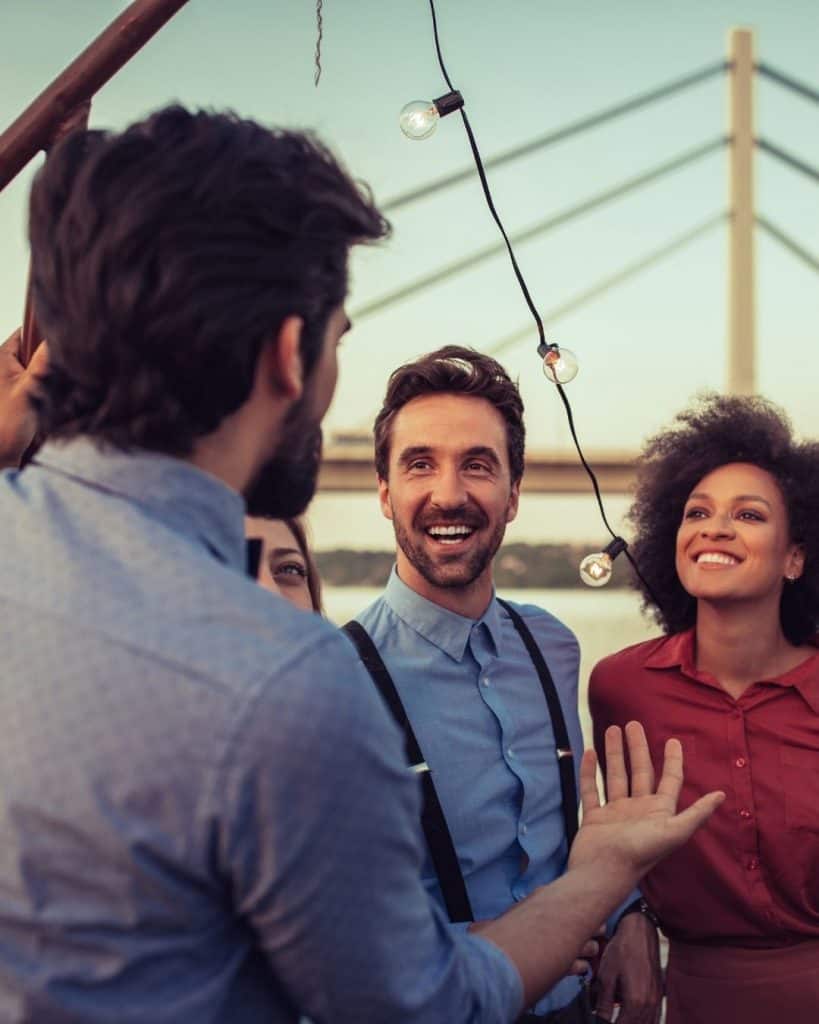 A business owner pitching his business to other business owners | a featured image from "How Do I Build Trust Online (For My Brand)?" | LOJO Marketing