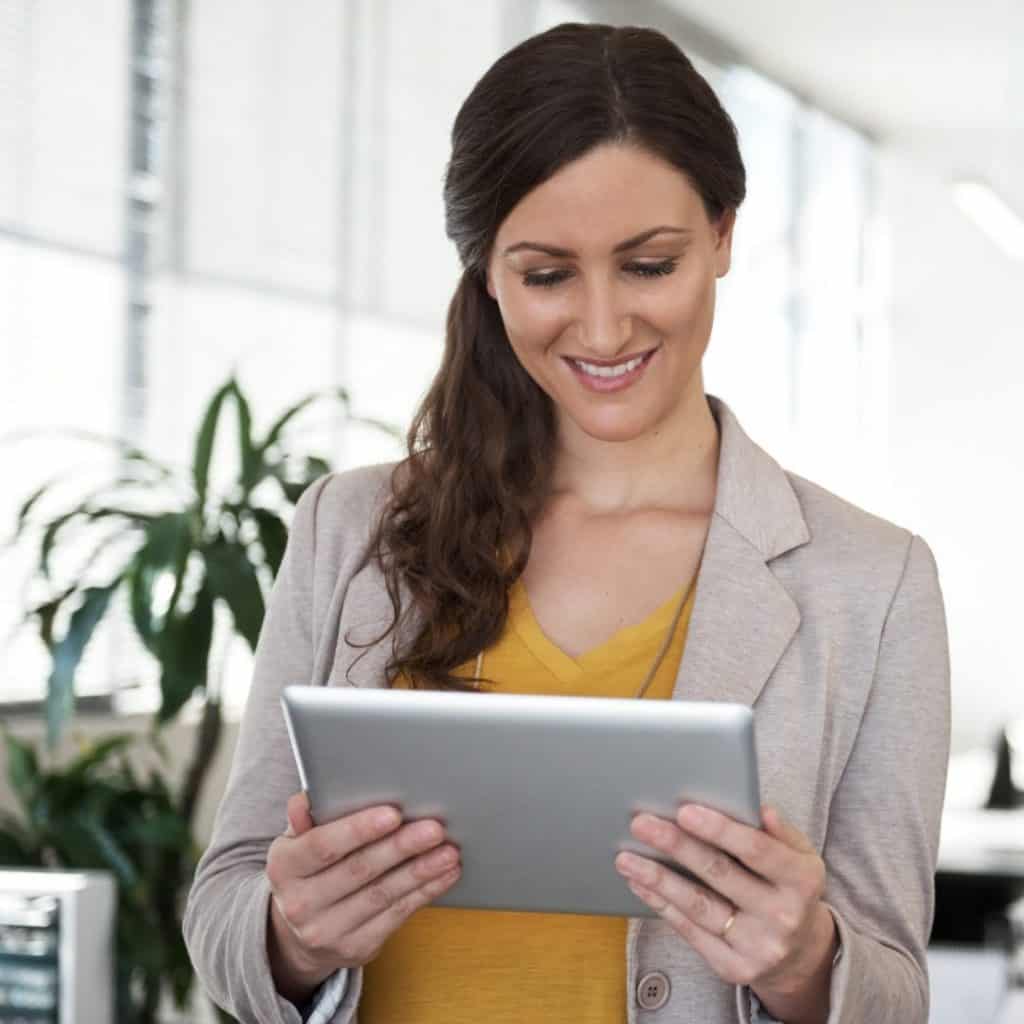 A business owner reviewing her ads on Google | A featured image from "What Do I Need To Know About The Latest Google Ads Updates (2021)?" | LOJO Marketing