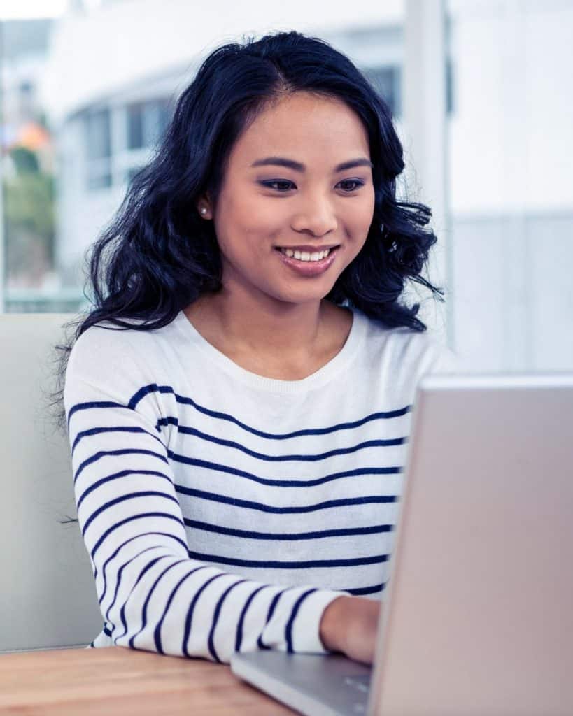 A business owner reviewing her ads on Google | A featured image from "What Do I Need To Know About The Latest Google Ads Updates (2021)?" | LOJO Marketing